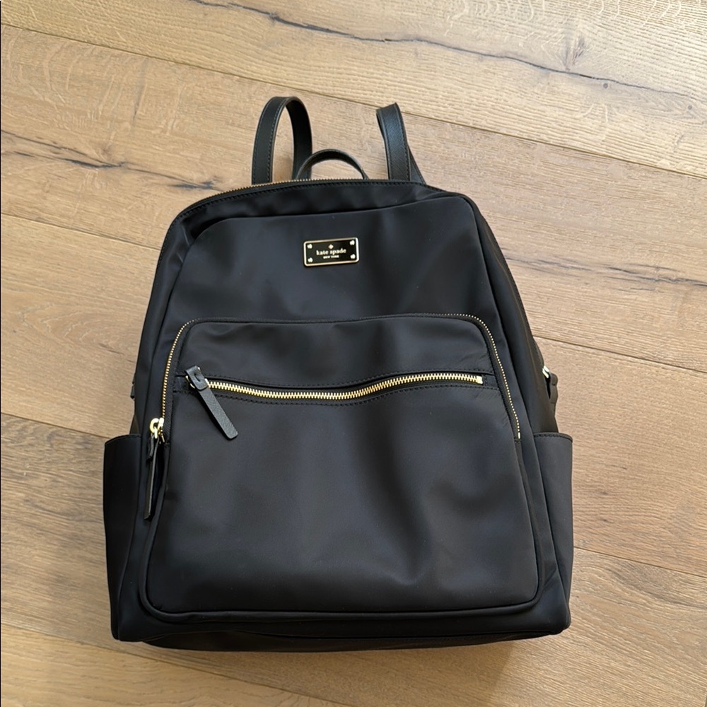 Kate Spade Black Modern Backpack with Gold Accents